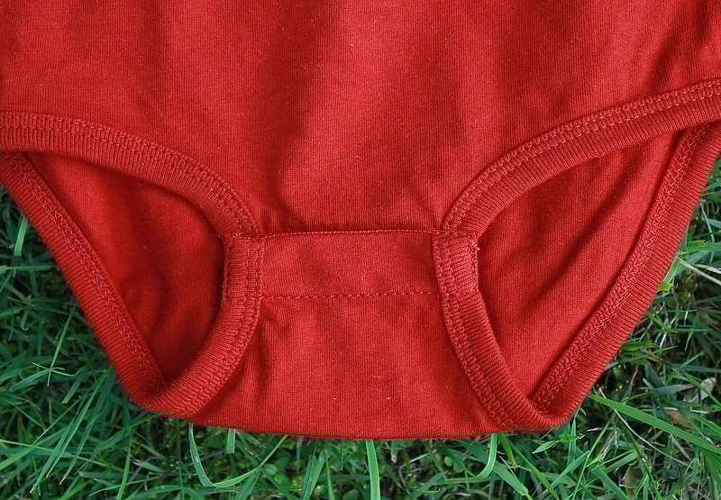 red onesie bottom stitching