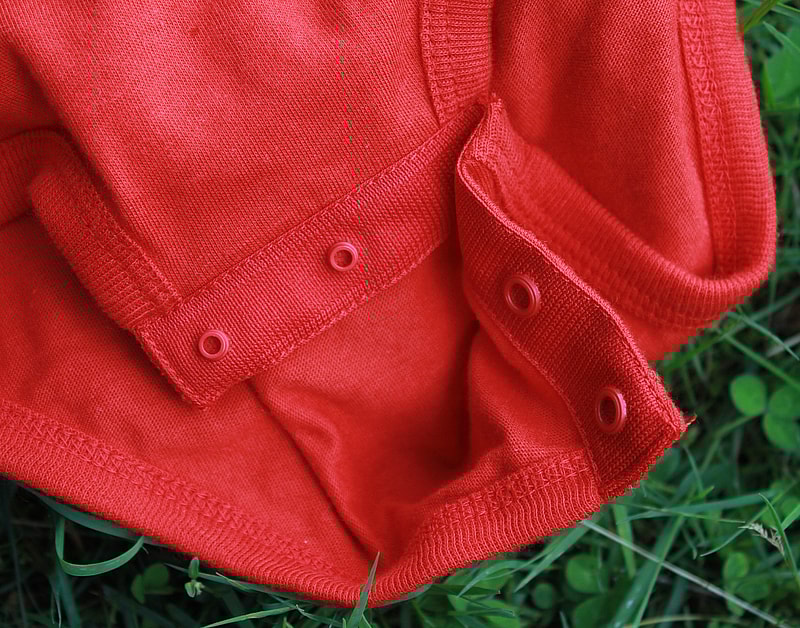 red onesie snaps