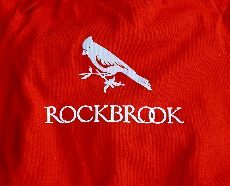 red onesie logo