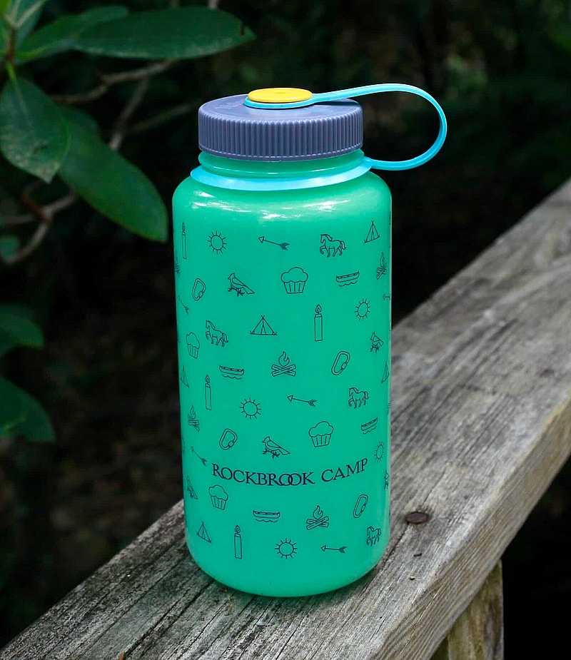 glow green water bottle with purple top