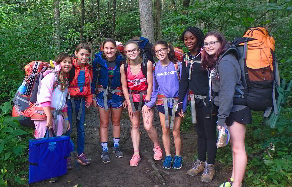 camp girls on backpacking trip