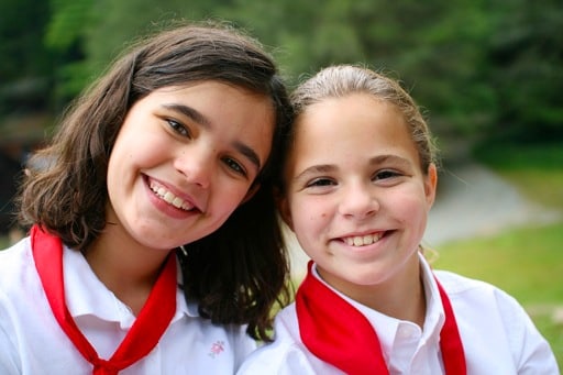 Friends dressed in camp uniforms