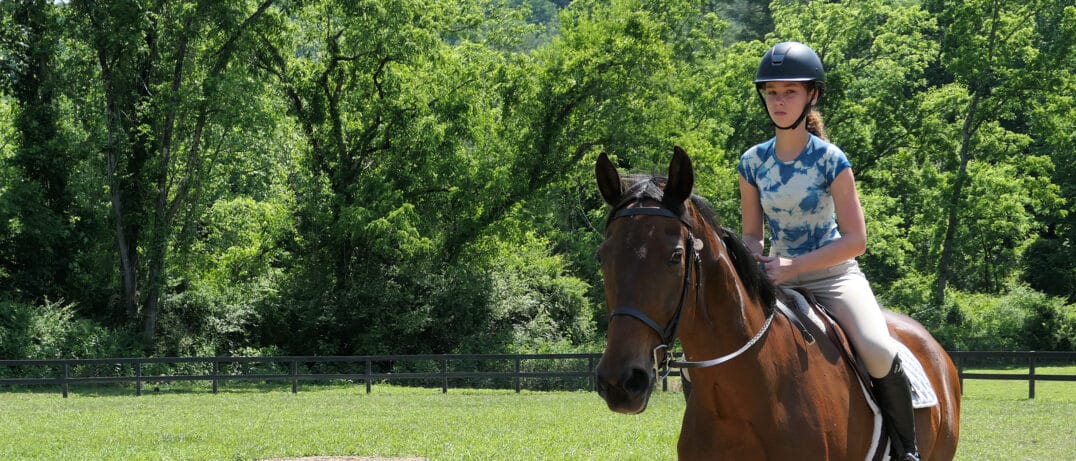 camp girls riding horse