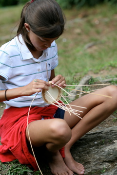 kids summer crafting by the stream
