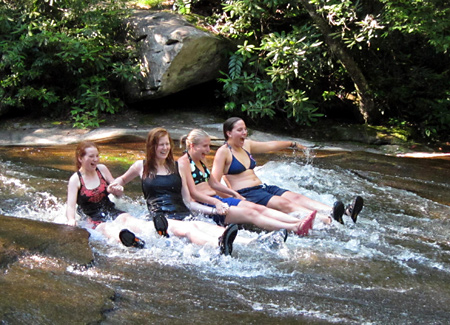 Children swimming in nature