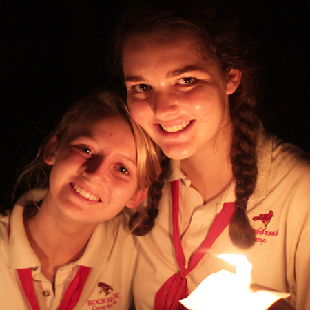 campers at spirit fire with candle