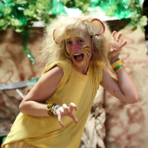 Lion costume girl at camp banquet
