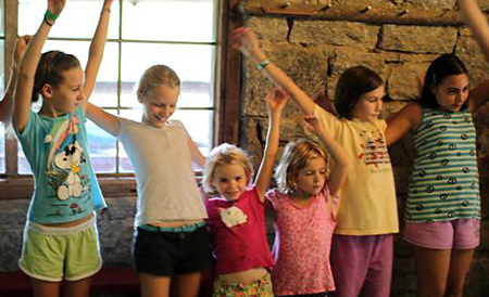 girls dancing together at summer camp