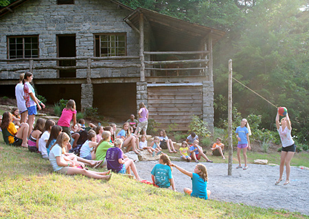 camp teatherball tournament at twilight