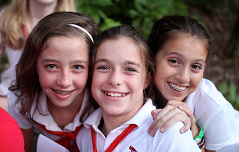 Smiling happy summer camp girls