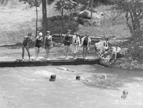 girls swimming lake