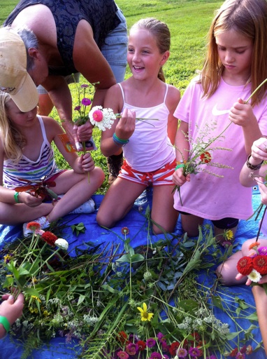 tiny camp girls picking flowers