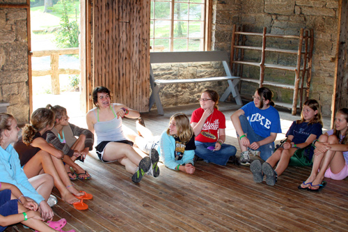 Campers sitting on floor