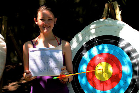Camp girl hits bullseye in archery