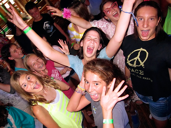 teenage campers dancing at camp dance