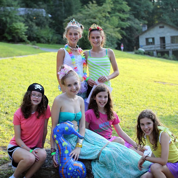 Summer camps girls pose in Disney costumes