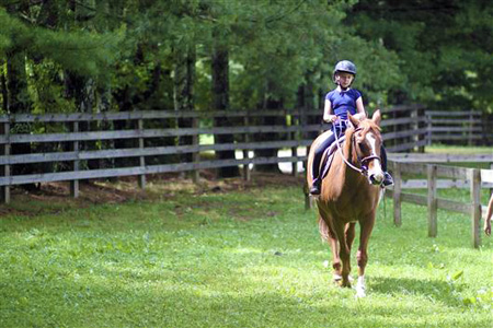 Horseback riding camp girl