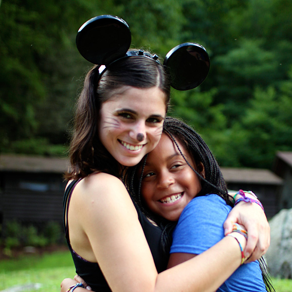 Camp counselor dressed as mini mouse