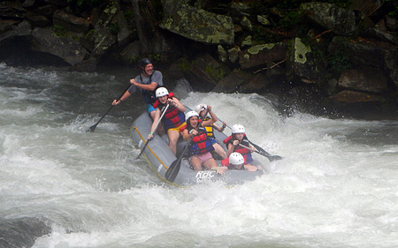 Raft goes over Nantahala river falls