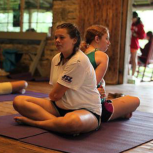 girls yoga partner pose