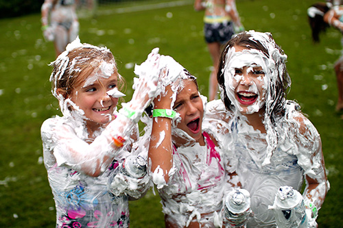 Camp girls are mischievous with shaving cream