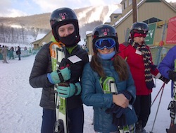 Evie and Sarah skiing
