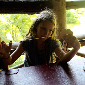 Camper with bumble weaving loom