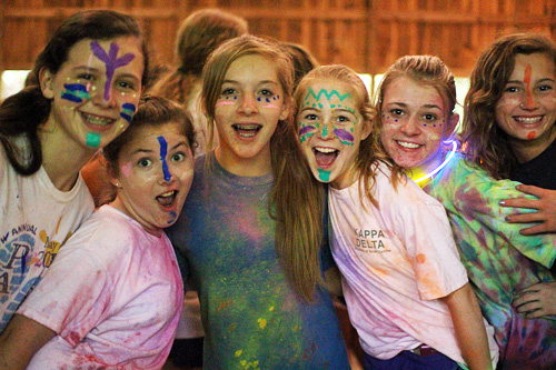 Children dancing with face paint