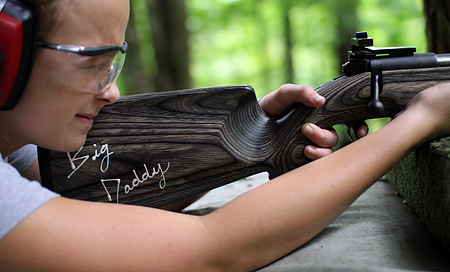 Rifle Marksman girl at camp