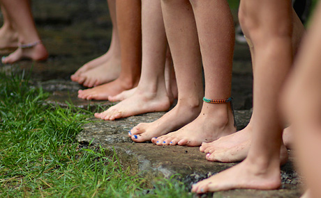 Feet of girls waiting to swim