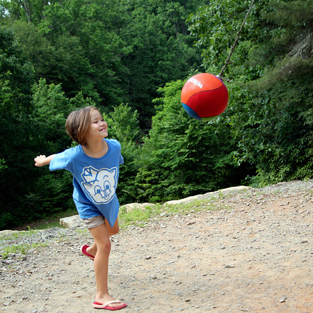 tetherball playing child