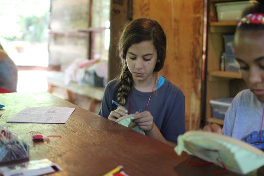 Careful Stitching at camp