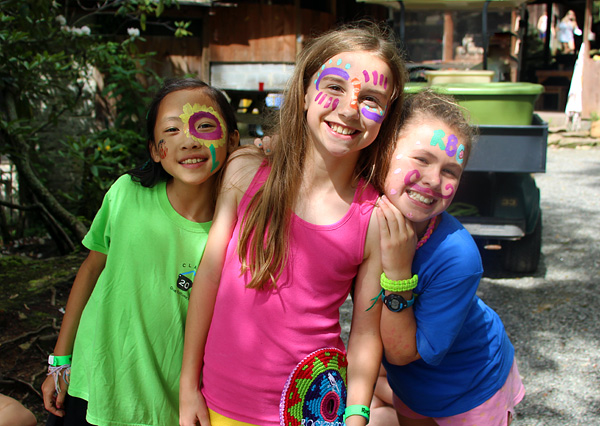 Face painted camp girls