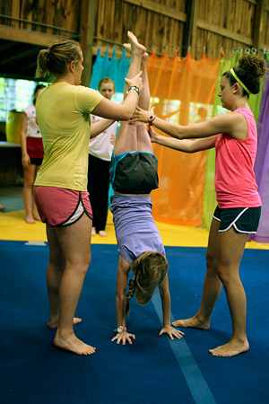 Gymnastics camper doing handstand