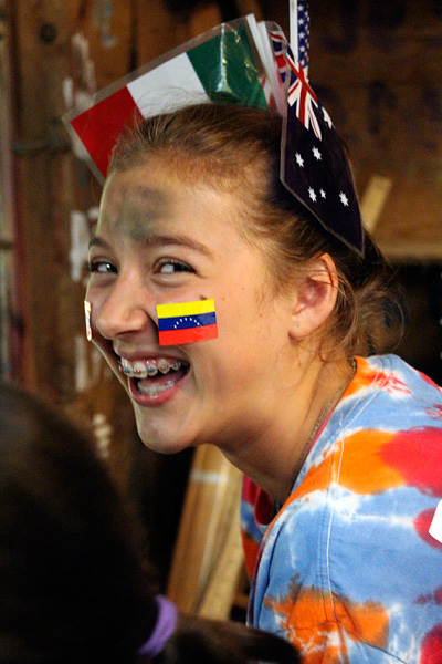 Camper with flags in her hair