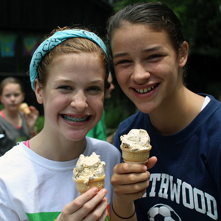 Friends at summer camp eating ice cream