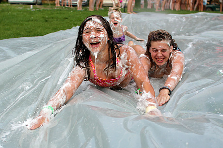 Camp girls sliding