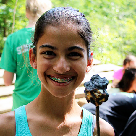 Girl and roasted marshmallow