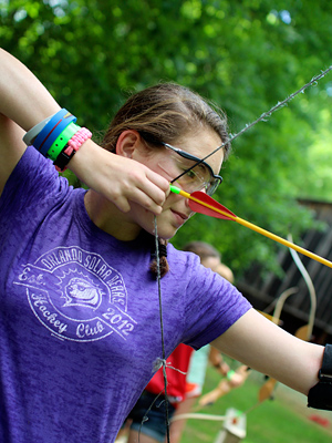 archery camp girl shooting