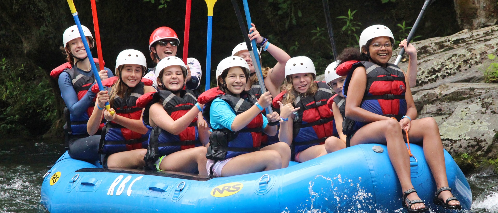 camp girls rafting fun