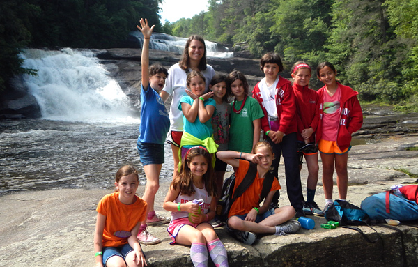 Kids Hiking by Waterfall