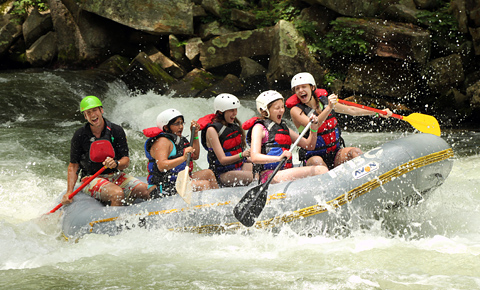 girls whitewater rafting fun