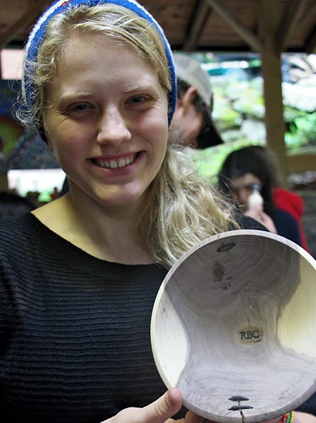 Camp displaying carved bowl