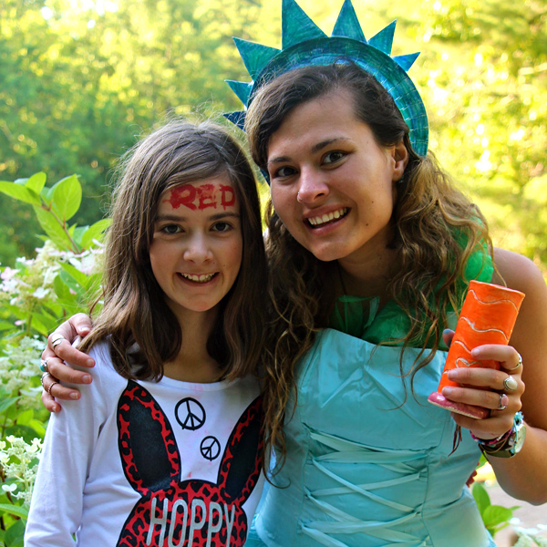 Camp girl with statue of Liberty