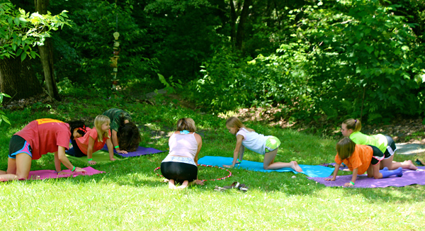 Outdoor Yoga session at summer camp
