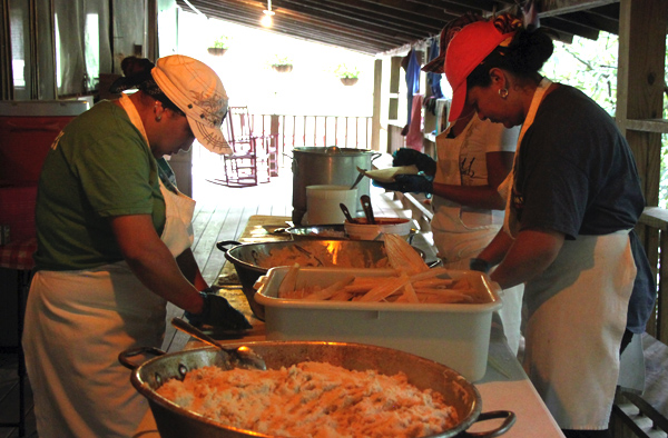 Making authentic corn tamales at camp