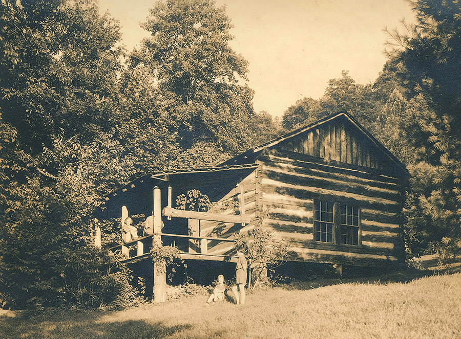 An authentic log cabin at summer camp for girls