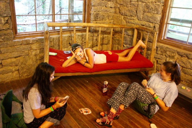 Girls playing cards at slumber party