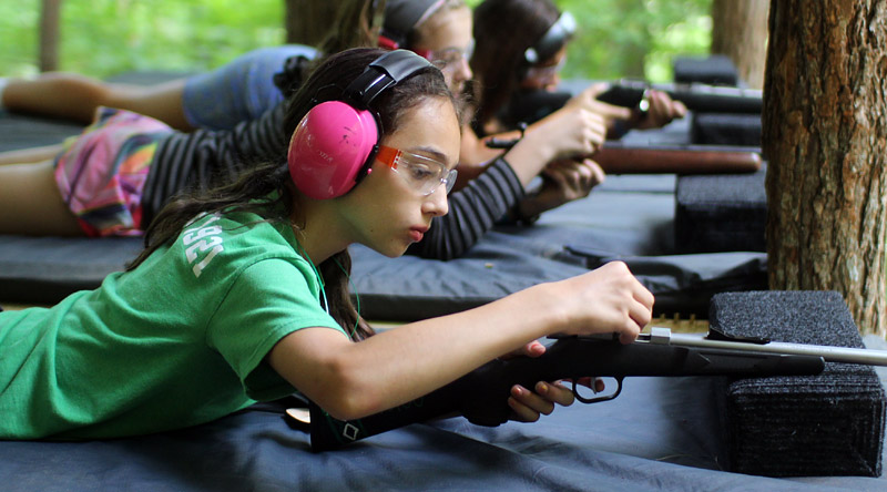 Girl Loading a Gun