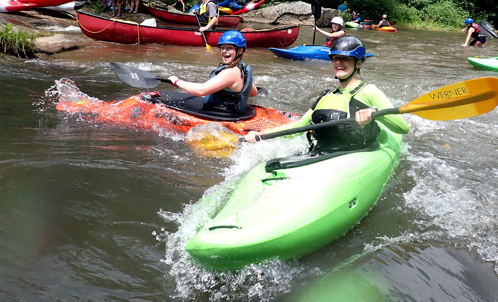 Kayaking surfing whitewater wave